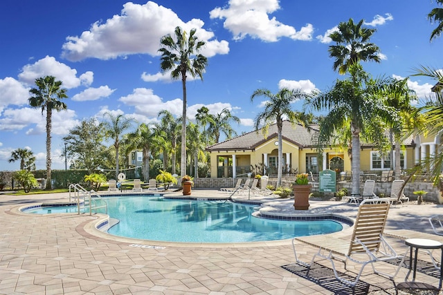 4020 Grande Vista Blvd Unit 204, Saint Augustine, FL 32084 - community pool featuring a patio and fence