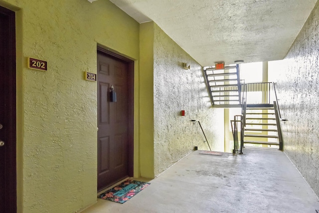 4020 Grande Vista Blvd Unit 204, Saint Augustine, FL 32084 - doorway to property featuring stucco siding