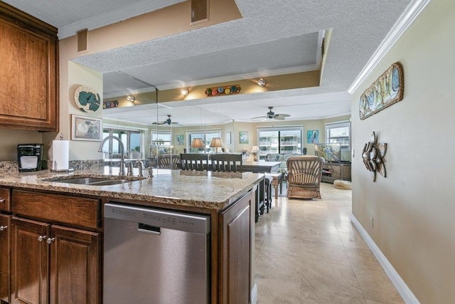 4670 A1A S Unit 1309, Saint Augustine, FL 32080 - kitchen with a textured ceiling, crown molding, dishwasher, a ceiling fan, and a sink