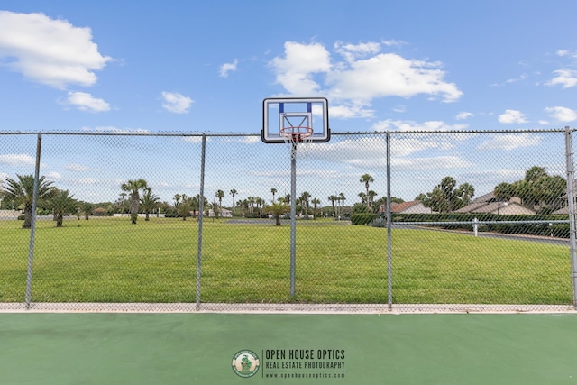 4670 A1A S Unit 1309, Saint Augustine, FL 32080 - view of basketball court featuring fence and a yard