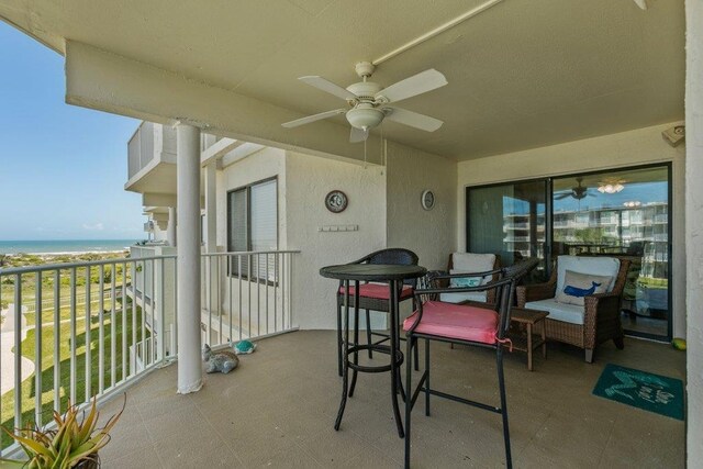 4670 A1A S Unit 1309, Saint Augustine, FL 32080 - balcony with a ceiling fan and a water view