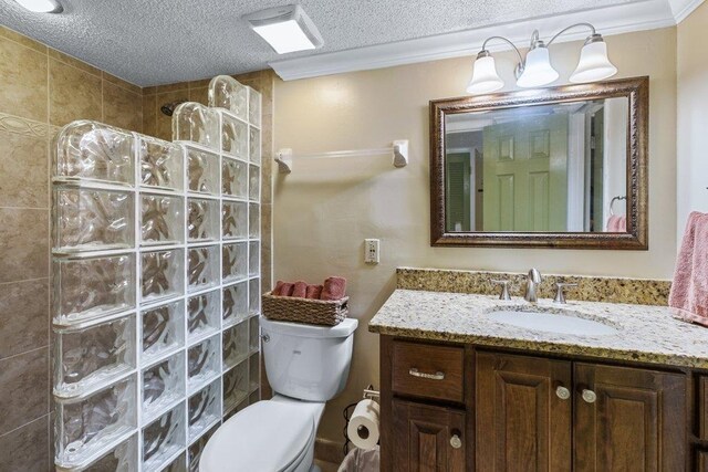 4670 A1A S Unit 1309, Saint Augustine, FL 32080 - full bath featuring toilet, a walk in shower, vanity, and a textured ceiling