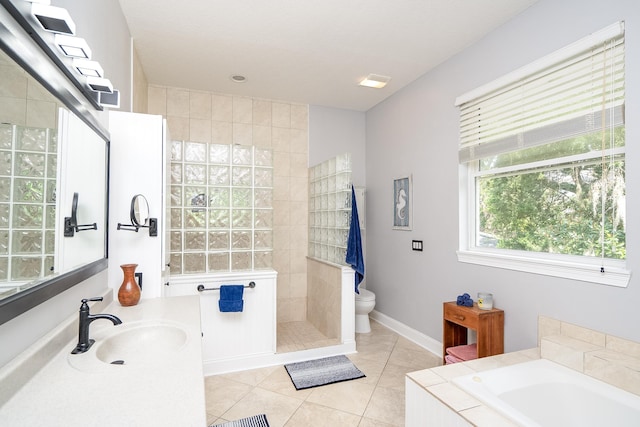 full bathroom with separate shower and tub, tile patterned flooring, vanity, and toilet