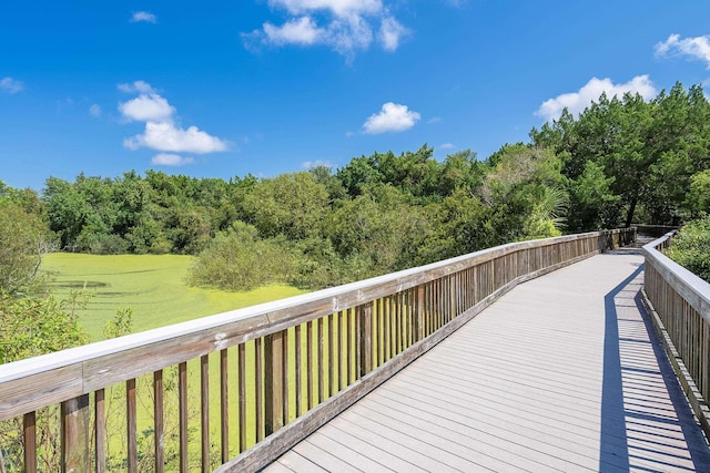 deck featuring a lawn