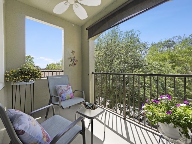 balcony featuring a ceiling fan