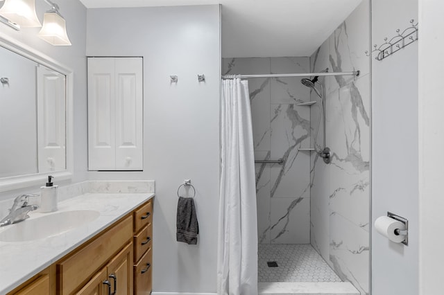 bathroom featuring a shower with curtain and vanity