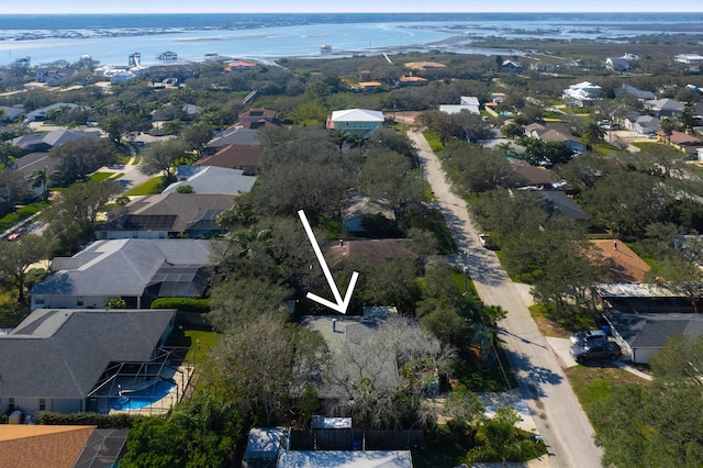 aerial view featuring a residential view and a water view