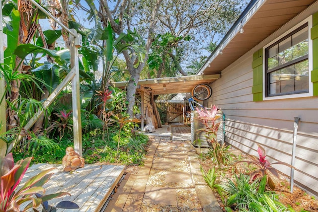 view of yard with a patio and a gate