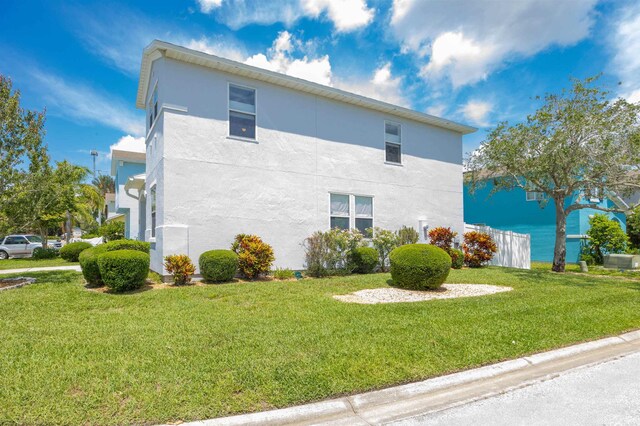 116 Serenity Bay Blvd, Saint Augustine, FL 32080 - view of property exterior with a yard and stucco siding
