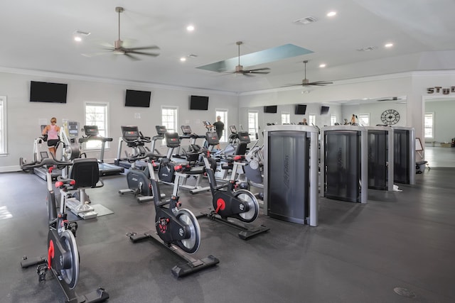 gym with crown molding, recessed lighting, visible vents, a ceiling fan, and baseboards