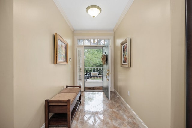 doorway featuring ornamental molding and baseboards