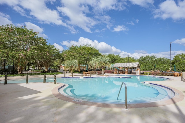 pool featuring a patio area