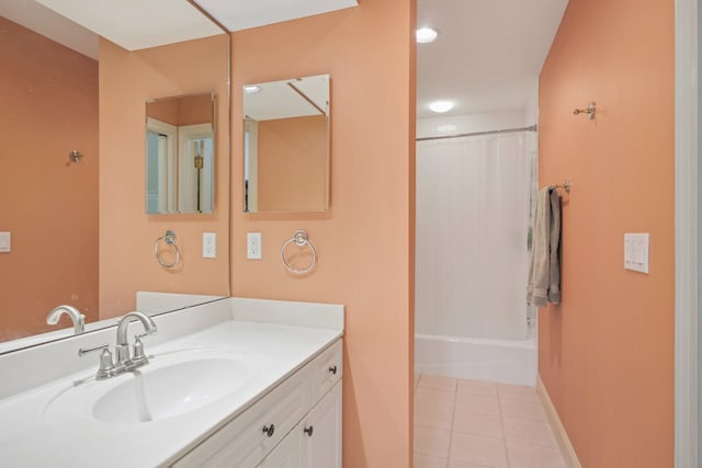 bathroom with tile patterned floors, vanity, and shower / bath combination with curtain