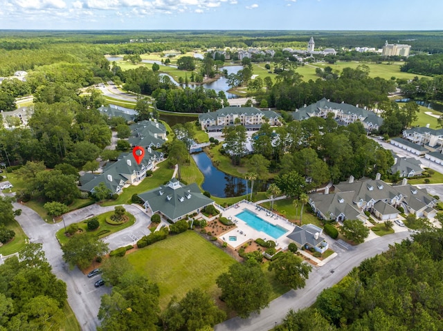 aerial view with a residential view and a water view