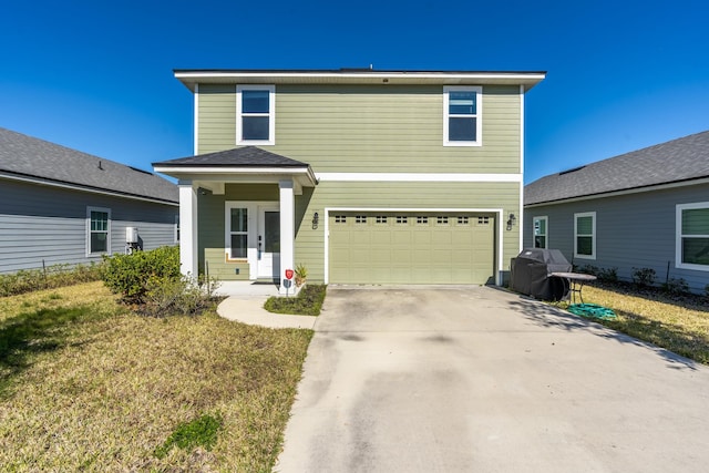 front facade featuring a front yard, french doors, and a garage