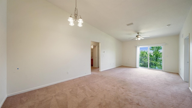 2384 Golden Lake Loop, Saint Augustine, FL 32084 - spare room with light carpet, baseboards, ceiling fan, a chandelier, and high vaulted ceiling
