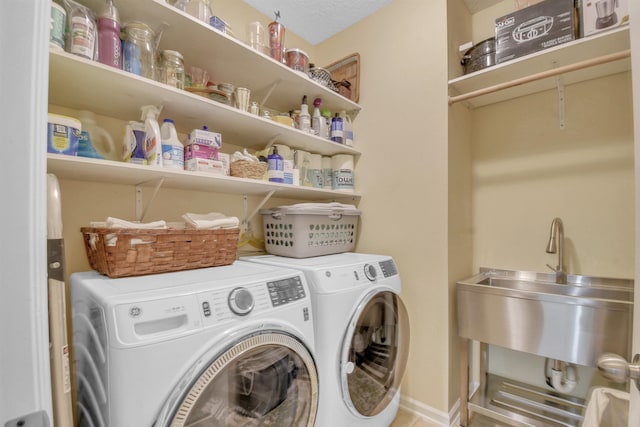 laundry room featuring laundry area and separate washer and dryer