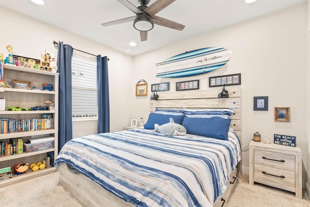 carpeted bedroom with ceiling fan