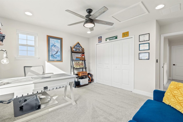 interior space with light carpet and ceiling fan