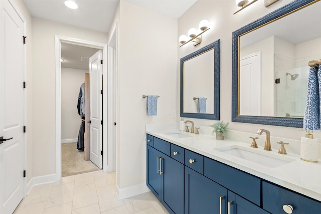 bathroom featuring vanity and an enclosed shower