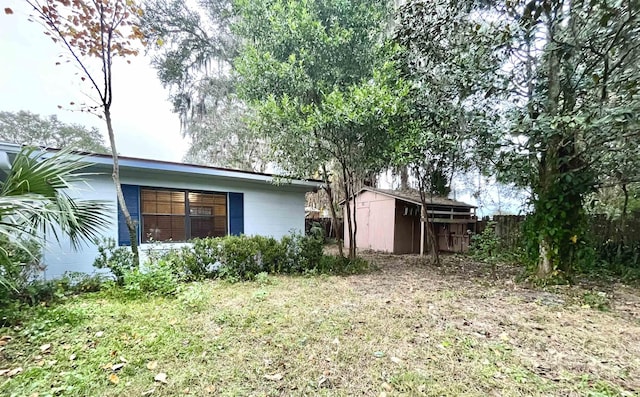 exterior space with a storage unit