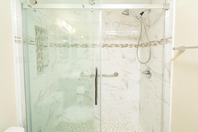 full bath featuring a stall shower