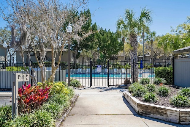 community pool featuring fence