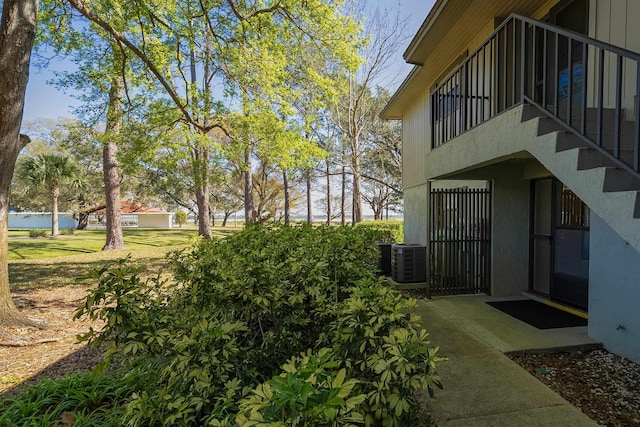 view of yard featuring central AC