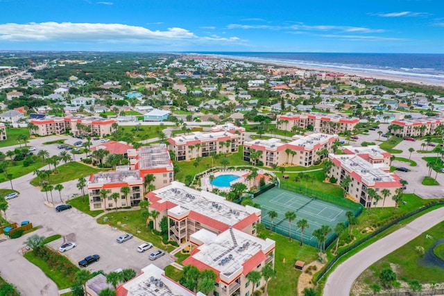 aerial view featuring a water view and a beach view