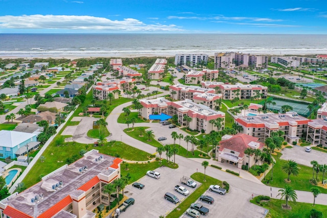 aerial view featuring a beach view and a water view