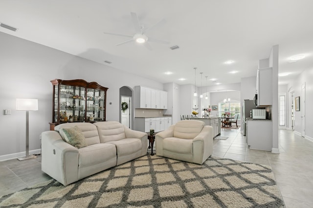 279 Spring Creek Way, Saint Augustine, FL 32095 - living room featuring ceiling fan, light tile patterned floors, arched walkways, and recessed lighting