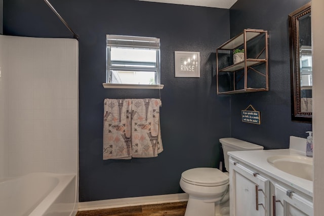 3010 SE 46th Ave, Ocala, FL 34480 - full bathroom featuring vanity, toilet, wood finished floors, and  shower combination