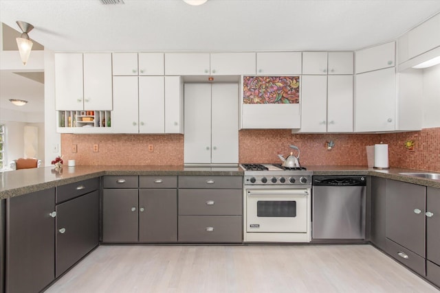 kitchen featuring gas range, tasteful backsplash, light hardwood / wood-style flooring, dishwasher, and white cabinets