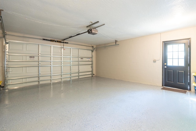 garage featuring concrete block wall