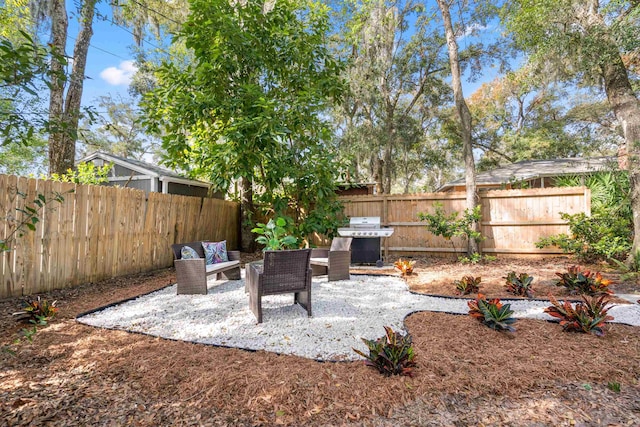 view of patio featuring a fenced backyard and area for grilling