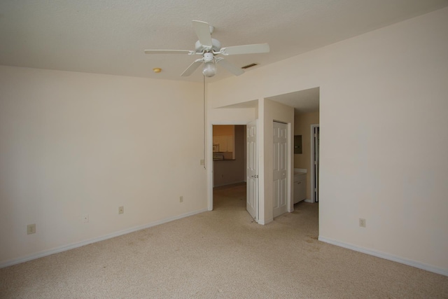 21201 Harbour Vista Cir, Saint Augustine, FL 32080 - empty room featuring light carpet and a ceiling fan