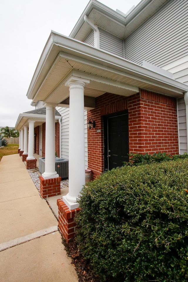 21201 Harbour Vista Cir, Saint Augustine, FL 32080 - entrance to property with covered porch and brick siding