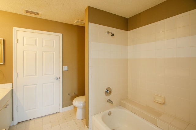 21201 Harbour Vista Cir, Saint Augustine, FL 32080 - bathroom featuring tile patterned floors, vanity, tub / shower combination, and a textured ceiling
