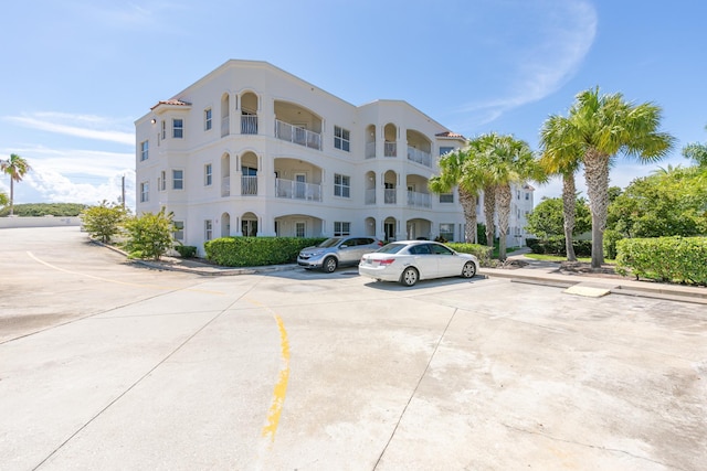 264 Gibraltar Ct Unit 102, Saint Augustine, FL 32080 - view of apartment building / complex featuring uncovered parking