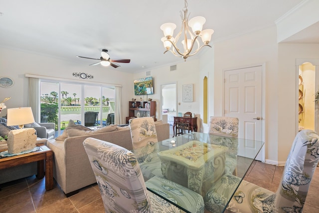 264 Gibraltar Ct Unit 102, Saint Augustine, FL 32080 - tiled dining room featuring ceiling fan, ornamental molding, a chandelier, and arched walkways