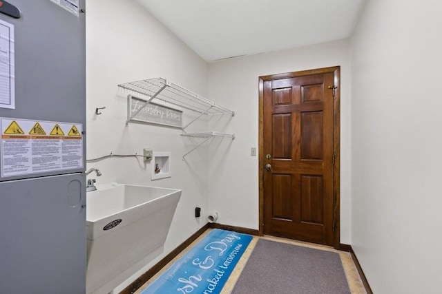 36 Lee Dr, Saint Augustine, FL 32080 - laundry room with hookup for a washing machine and baseboards
