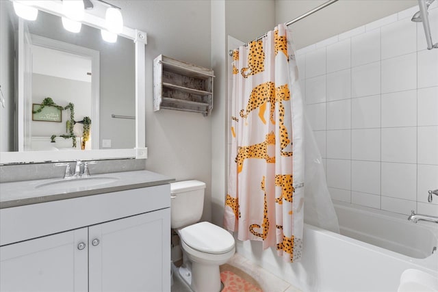 full bath featuring tile patterned floors, toilet, shower / tub combo with curtain, and vanity