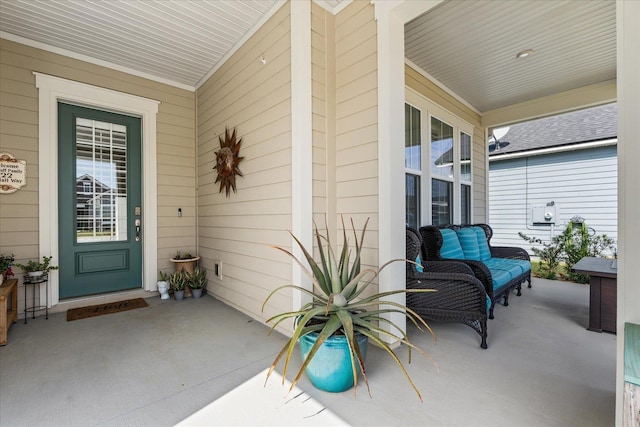 entrance to property with covered porch