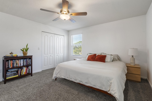 carpeted bedroom with a closet and ceiling fan