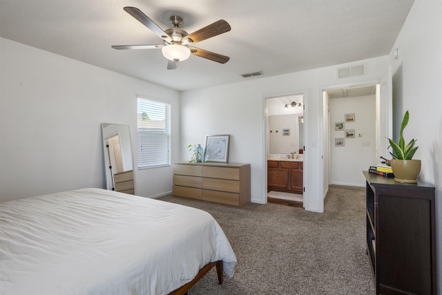 carpeted bedroom featuring ceiling fan and connected bathroom