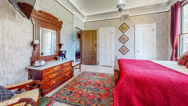 bedroom featuring crown molding and a high ceiling