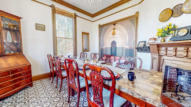 dining space featuring plenty of natural light and ornamental molding