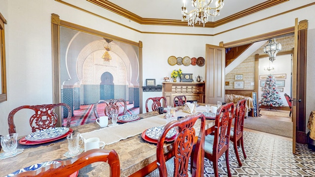 carpeted dining area featuring crown molding and a chandelier