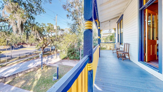 wooden terrace with covered porch