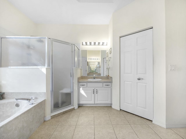 546 Sevilla Dr, Saint Augustine, FL 32086 - bathroom with a shower stall, tile patterned flooring, vanity, and a bath